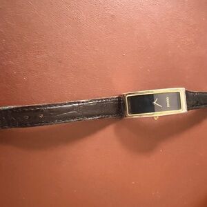 Gucci Rectangular Black and Gold Watch